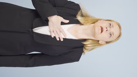 Vertical-video-of-Business-woman-experiencing-shortness-of-breath.